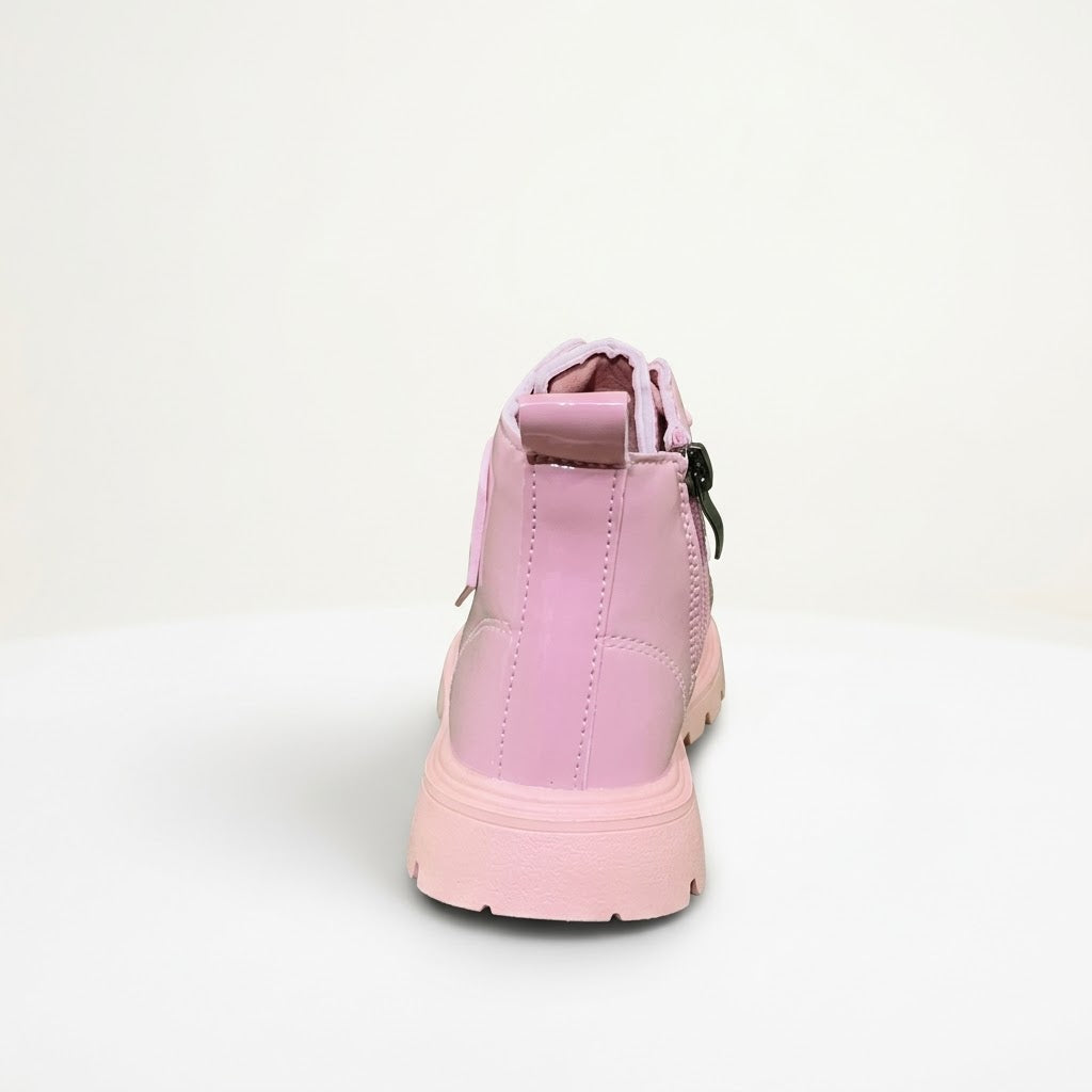 A light pink ankle boot shown from the back, featuring a thick matching pink sole and a small black zipper pull on the side.