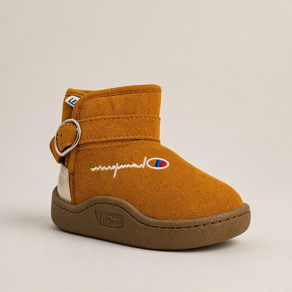 Brown suede ankle boots for kids with leopard fur lining, silver buckle, and chunky sole