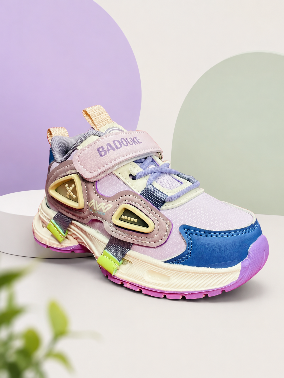 "Kids pastel purple and blue chunky sneakers with breathable mesh, hook and loop velcro strap, and non-slip rubber sole."